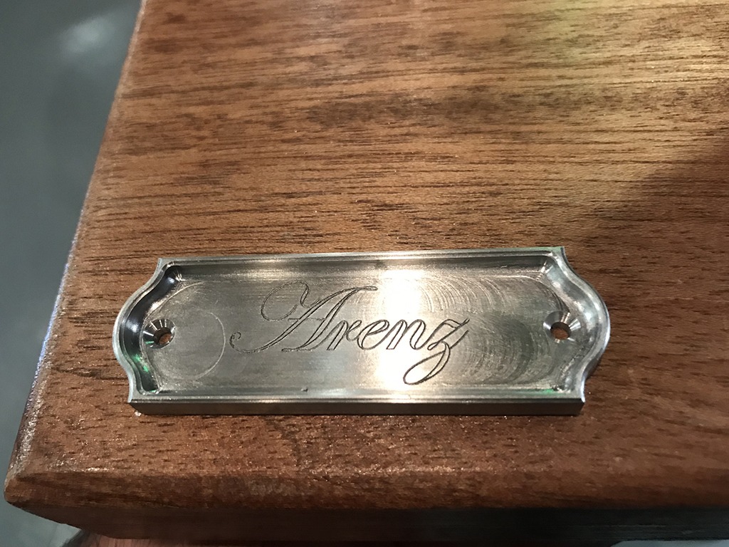 Silver "Arenz" name tag