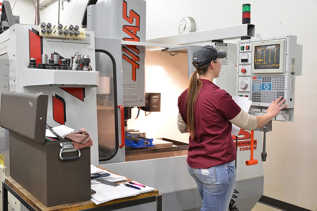 Female student checking program