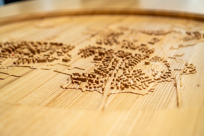 Light wooden table with carved design