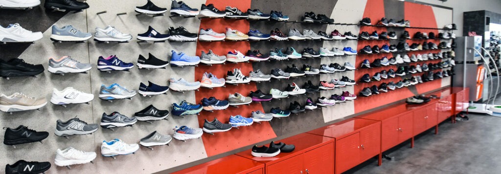 6 rows of new balance sneakers on display