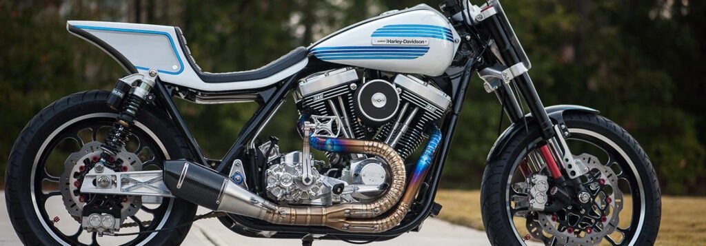 white and blue Harley Davisdon motorcycle