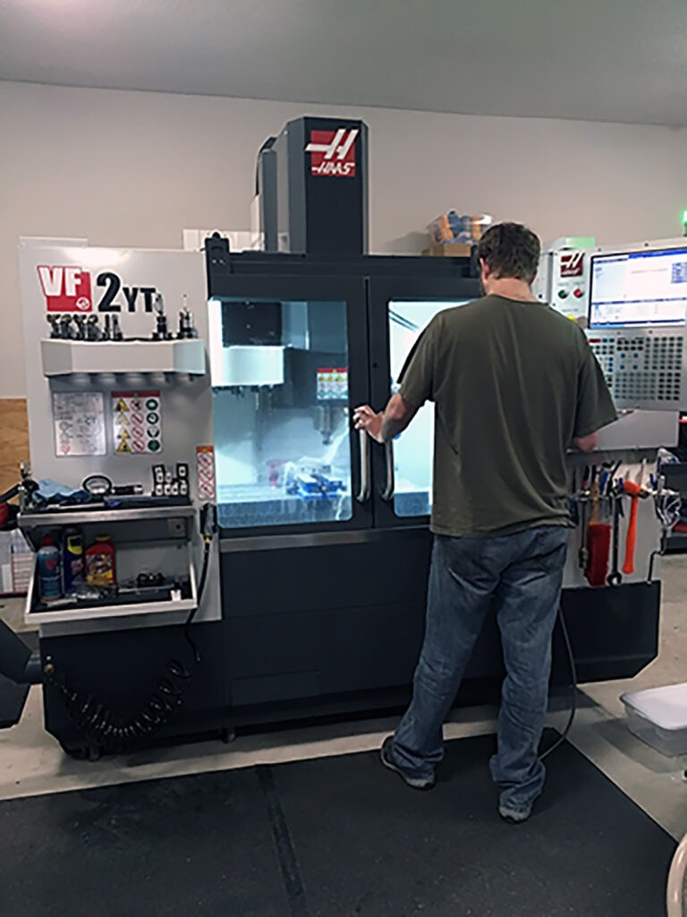 Man using a haas machine at Vernon Outdoors