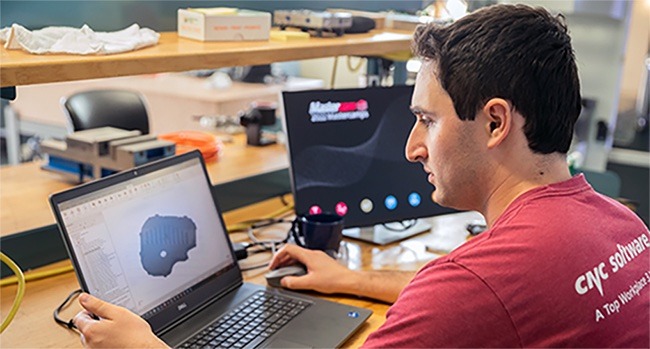 Man working with cam software