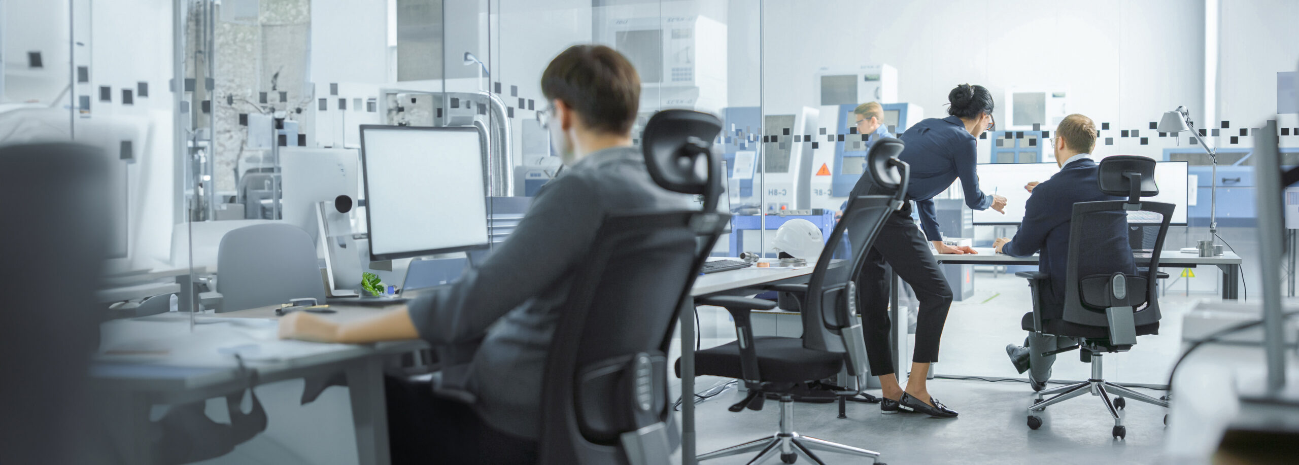 A team working at computer workstations