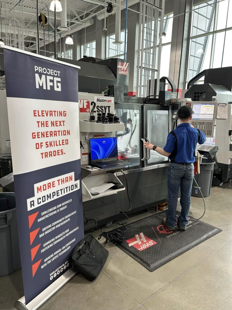 Student at a CNC machine